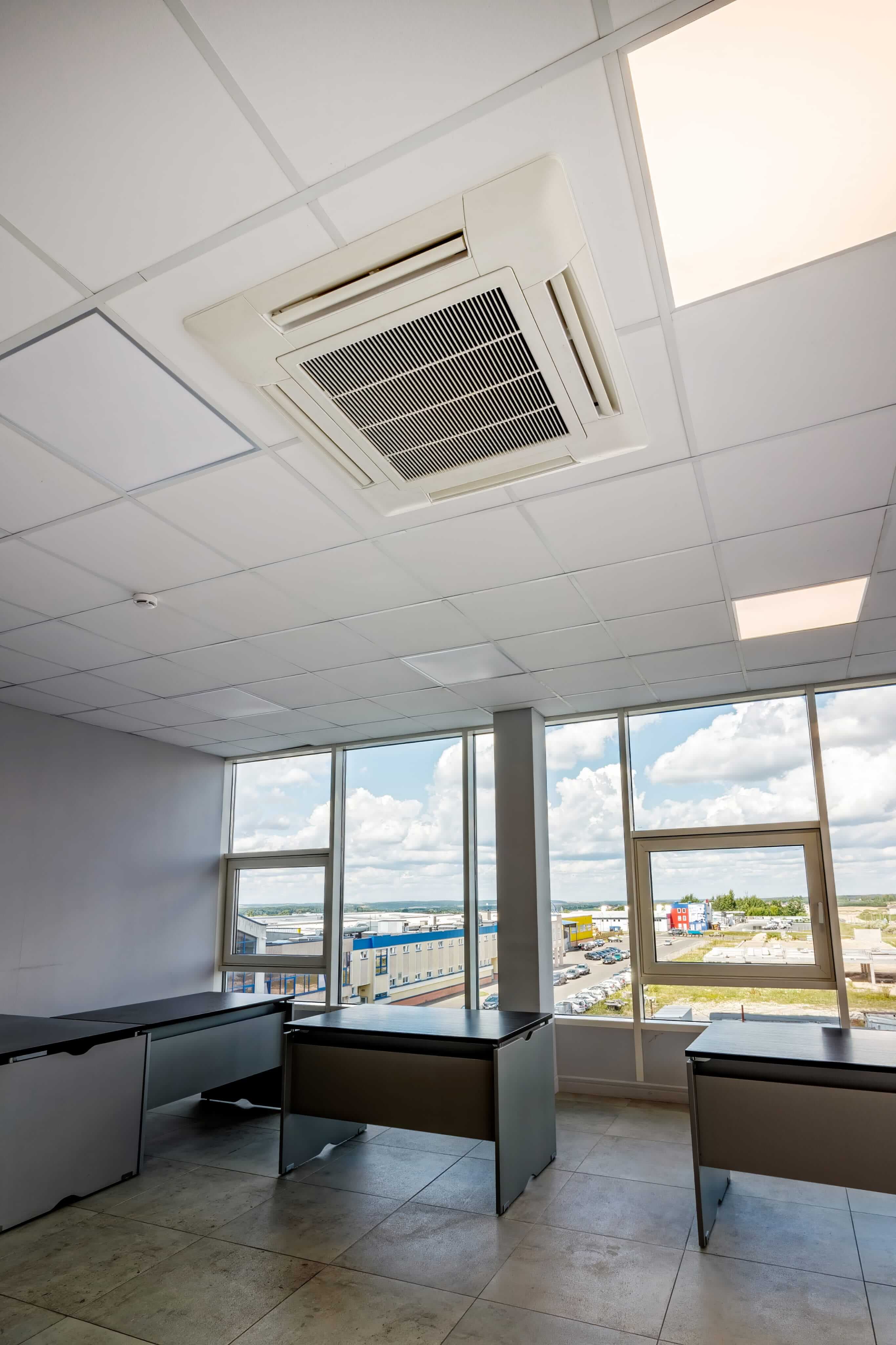 Ceiling cassette air conditioning unit installed in a commercial space