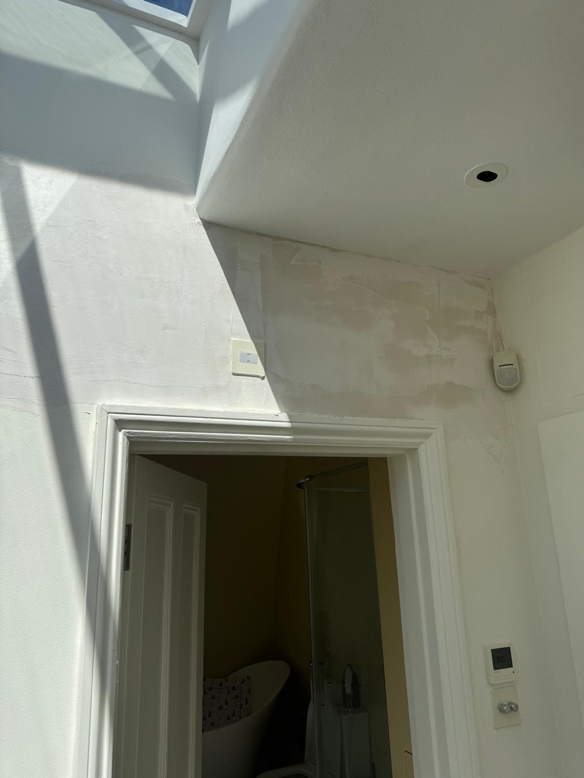 Core drilling through wall for AC refrigerant lines