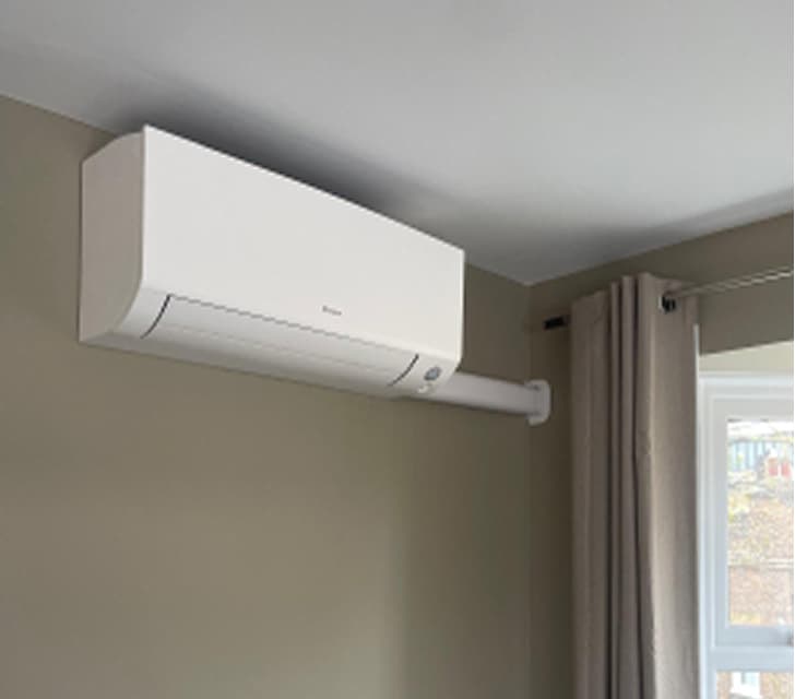 Air conditioning unit mounted on wall installed by DebonAir Cooling engineers