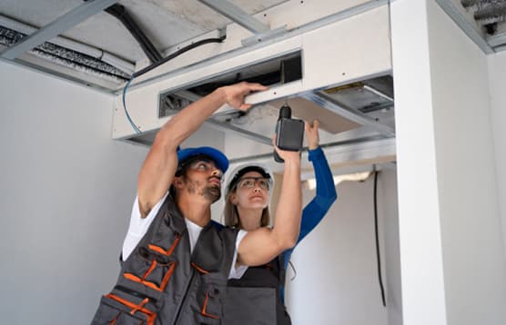 DebonAir engineer carrying out a professional air conditioning installation