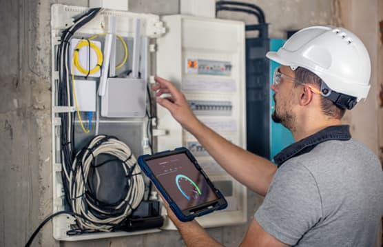 DebonAir engineer commissioning and testing a newly installed air conditioning system